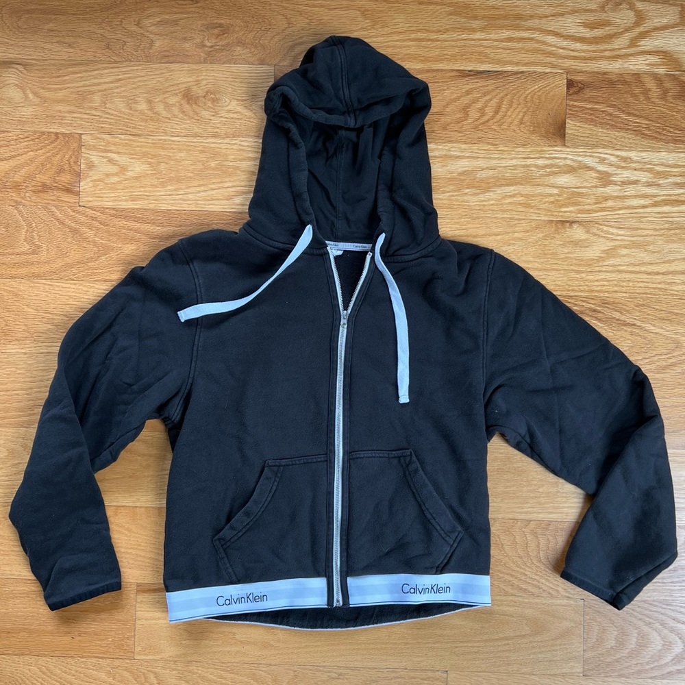 Woman’s Calvin Klein hoodie with zipper, size small
